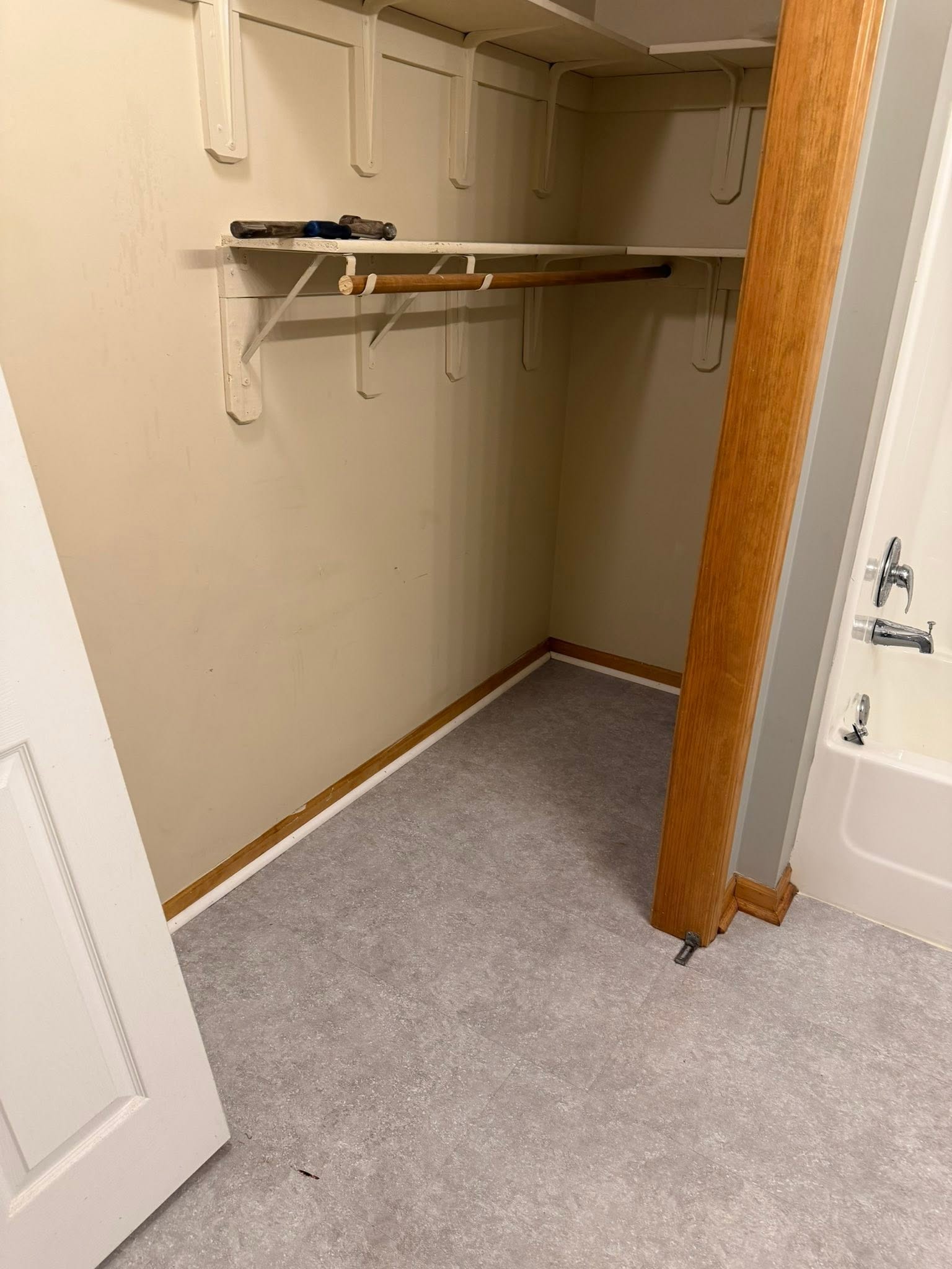 Closet and bathroom after move-in cleaning, spotless and ready